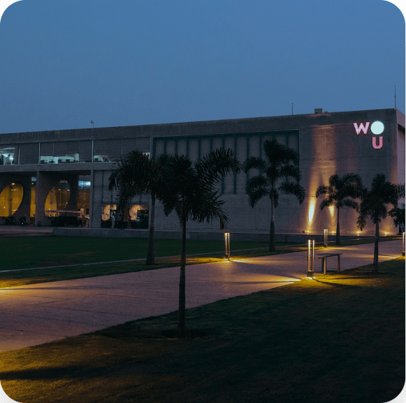 The Woxsen University campus at dusk